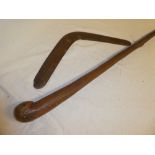 An old wooden rustic walking stick and an Australian hardwood boomerang (2)