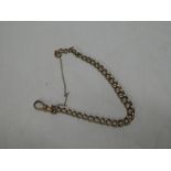 A 9ct gold chain link bracelet with safety chain