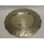 A Continental silver 800 standard circular tray with floral and scroll engraved borders,