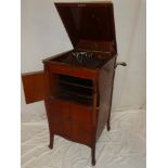 A His Master's Voice model 161 cabinet gramophone in mahogany case with accessories and 78 rpm