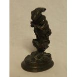 A good quality bronze figure of a standing hare wearing hunting clothing on oval base,