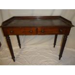 A Victorian mahogany rectangular side table with two drawers in the frieze on turned tapered legs