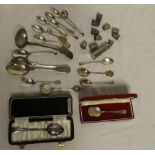 A selection of silver presentation spoons, condiment spoons, selection of thimbles,