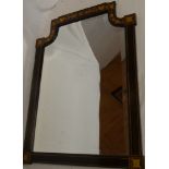 An Edwardian shaped rectangular bevelled wall mirror in inlaid mahogany frame,