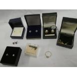 A 9ct gold dress ring, a small selection of various 9ct gold earrings and other earrings,