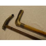 A gentleman's silver mounted malucca walking stick with antler handle and one other antler mounted