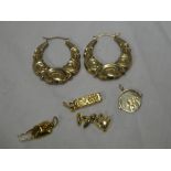 A pair of 9ct gold earrings and four various modern 9ct gold charms