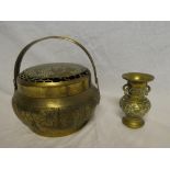 A Chinese brass cricket container/pot pourri with raised decoration and pierced lid and an Eastern