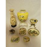A selection of Japanese Satsuma ceramics including ornamental bowl on brass stand, circular plate,