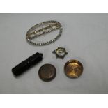 A Continental silver oval dress buckle set paste; miniature collapsible cheroot holder in jet case,