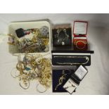 A large selection of various costume jewellery including necklaces, brooches, bracelets, earrings,