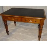 A 19th Century pine rectangular writing table with leather cloth writing surface,