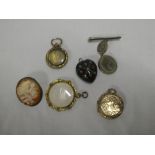 A 9ct gold circular locket pendant, lava cameo mounted brooch and other lockets and brooches,