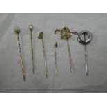 A 15ct gold stick pin set a small diamond and various other stick pins,