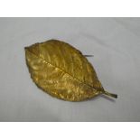 A Danish gold plated silver leaf patterned brooch by Danica,