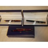 A good quality Waterman's fountain pen and propelling pencil in original cases and one other cased
