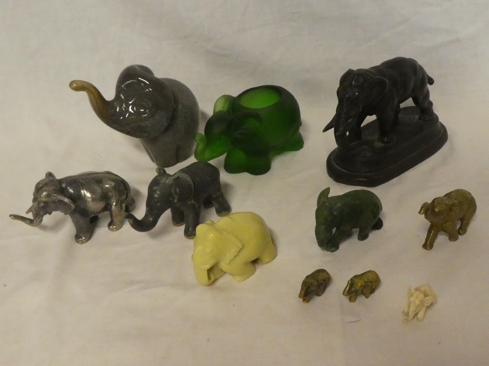 A selection of various elephant figures including spelter standing elephant;