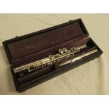 A silver-plated flute by Kreisler in fitted wooden case