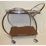 A 1960's chromium plated curved two tier tea trolley