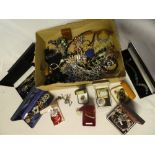 A box containing a selection of mixed costume jewellery