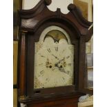 A 19th Century longcase clock with 12" painted arched dial with moon-phase and shipping aperture,