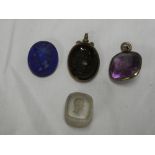 Two various 19th Century intaglio mounted pendants and two other similar panels (4)