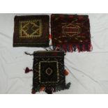 Three small Eastern hand-knotted saddle bags with geometric decoration