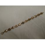 A 9ct gold circular link chain bracelet