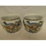 A pair of good quality modern Eastern china circular planters with painted bird and floral