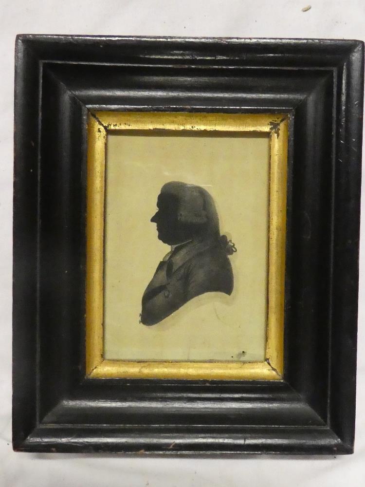 An early 19th Century miniature silhouette depicting a bust portrait of a gentleman "W Pinson" 4"