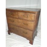 A mid 19th Century mahogany chest of two short and two long drawers with brass ring handles on