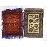 Two Eastern hand-knotted wool saddle bags with geometric decoration