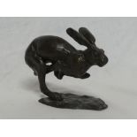 A good quality bronze figure of a running hare,