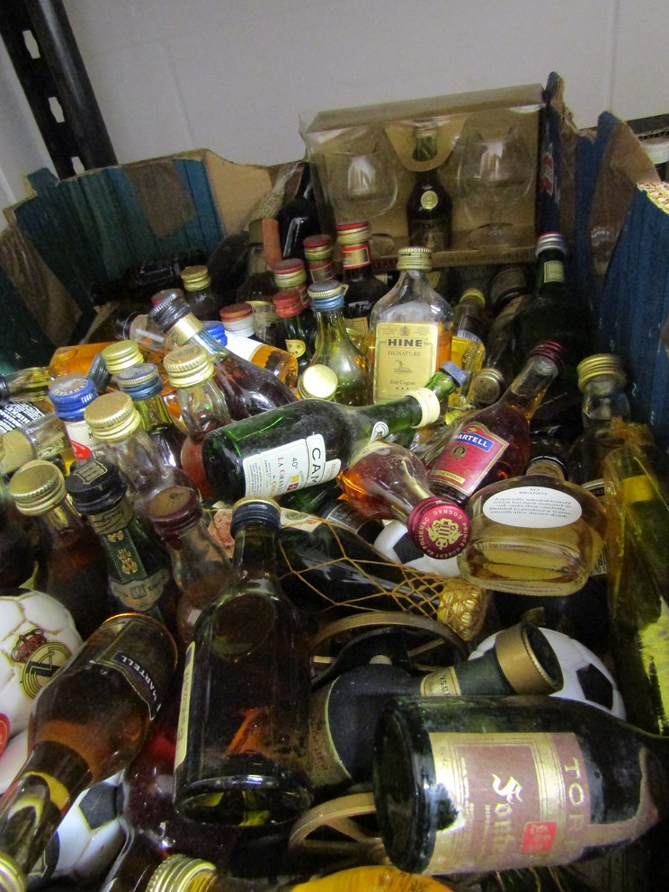 A large quantity of miniatures including brandy and whisky