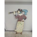 A vintage painted weather vane of a period dressed lady looking through a telescope,