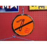 A circular enamel No Smoking sign,