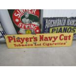 An enamel sign; Players Navy Cut Tobacco and Cigarettes,