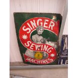 An enamel pictorial sign Singer Sewing Machines, 24" x 36",