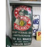 An enamel pictoral sign: Singer Sewing Machines, Best Needles, Oil, Parts and Repair,