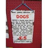 An enamel sign: "Dogs" Defence (General) Regulations 1939,