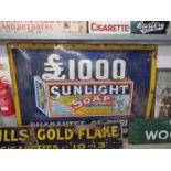 A Sunlight Soap pictorial enamel sign depicting a packet of soap with £1000 on top,