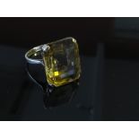 A gold set citrine ring, unmarked, size Q, 7.