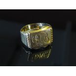 A gold signet ring, monogrammed, unmarked, size I, 2.