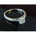 A 9ct gold diamond solitaire 0.