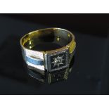 An 18ct gold two tone gents signet ring, the square front set with single diamond in star setting,