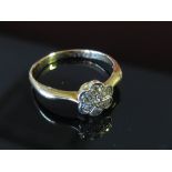 An Edwardian 18ct gold diamond daisy cluster ring, size O/P, 2.
