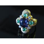 An amethyst, cabochon emerald and diamond ring, marked 18ct,