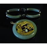 A Jade pendant set with dragon and pheasant,