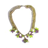 An Edwardian necklace with glass cluster droplets in suffragette colours