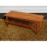 A Mackintosh teak coffee table with dowel under tier 124cm x 52cm x 46.